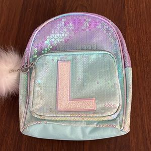 Brand new mini L backpack (made by Justice)